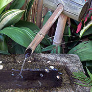 japanese water bowl with bamboo water spoutl